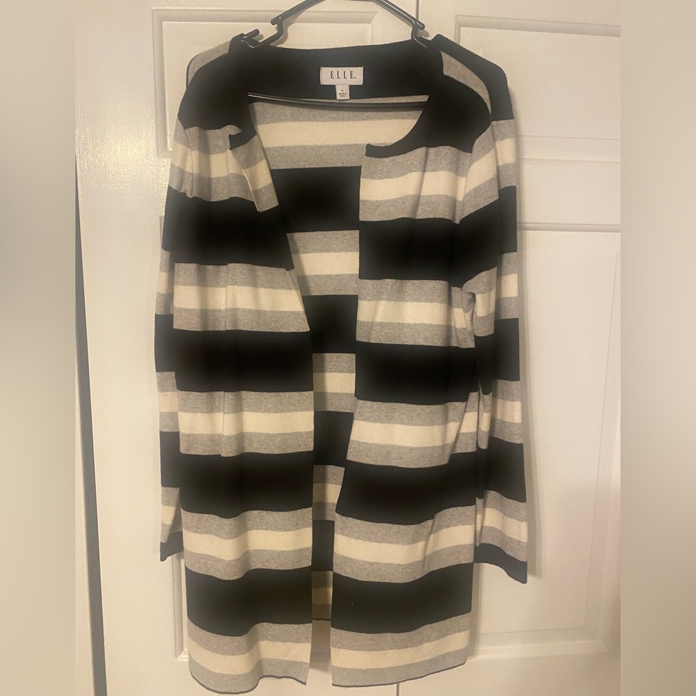 Open striped sweater. Quality material. Barely worn. Size large.